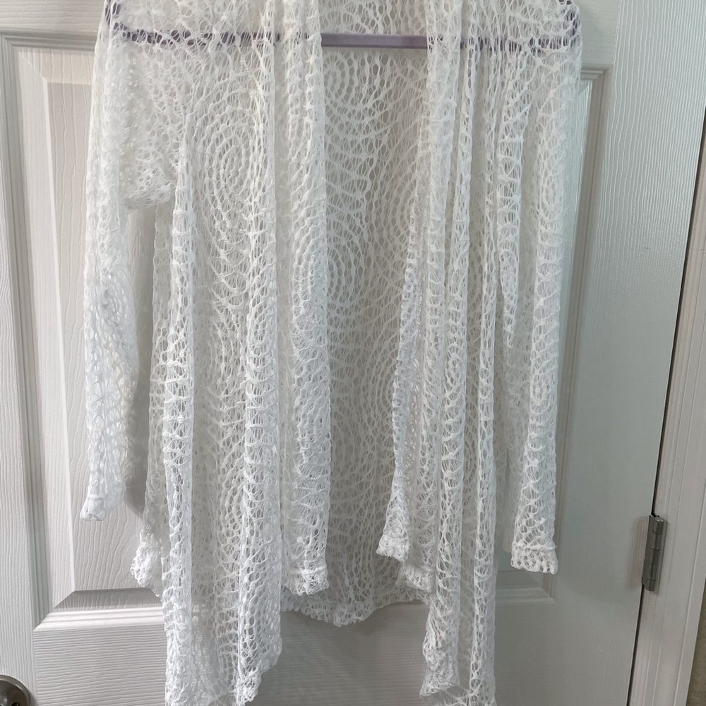 Lacy summer wrap.  No size.  Soft and flowy with asymmetrical bottom.